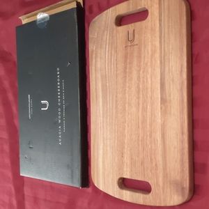 Uncommon James a c a c i a wood cheese board/cutting board.    Size 15 in x 9 in